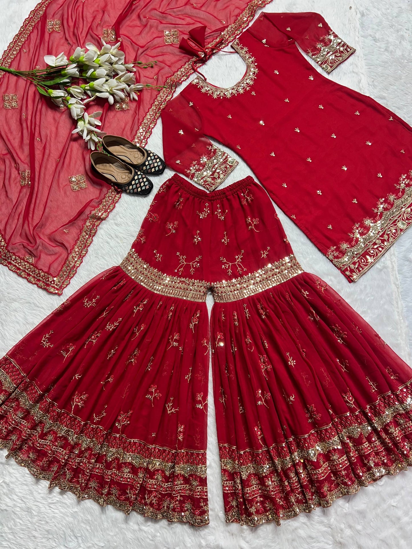 Wonderful Red Color Faux Georgette Embroidered Sharara Suit