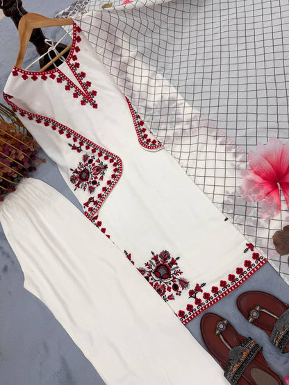 Peaceful White Color Embroidered Thread Work Palazzo Suit