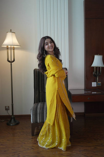 Traditional Wear Yellow Color Faux Georgette Sequence Embroidered Sharara Suit