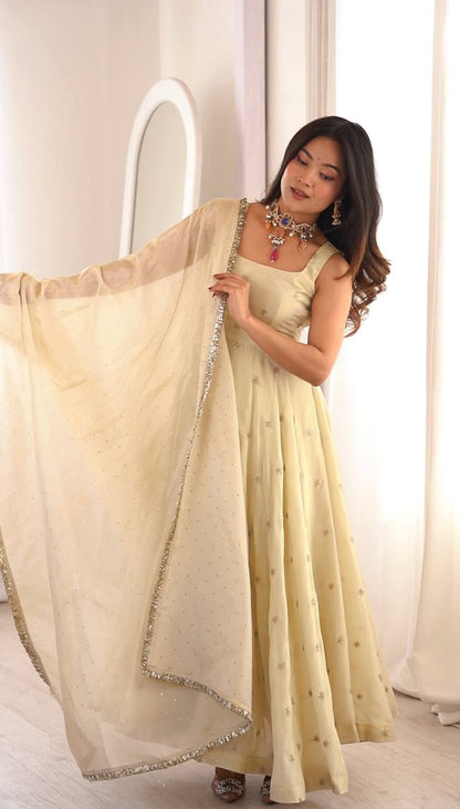 Innovative Beige Color Embroidered Anarkali Gown
