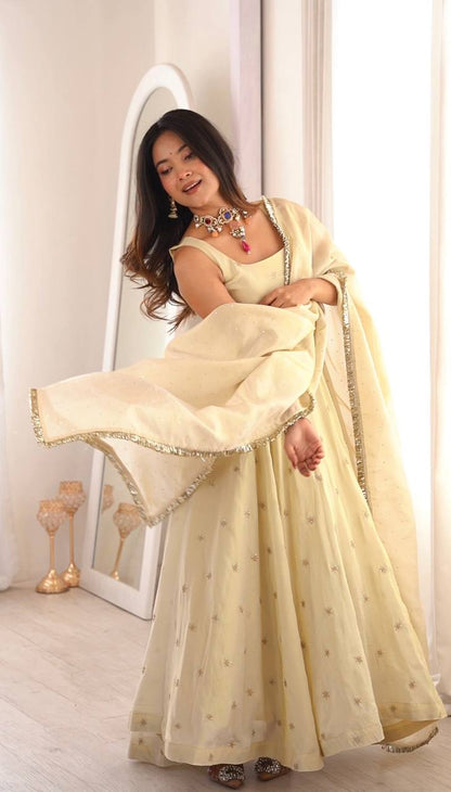 Innovative Beige Color Embroidered Anarkali Gown