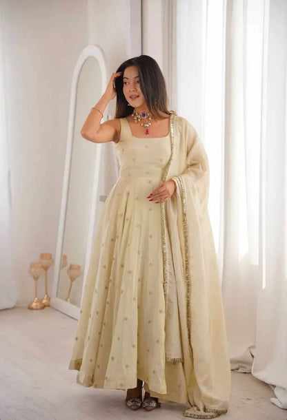 Innovative Beige Color Embroidered Anarkali Gown
