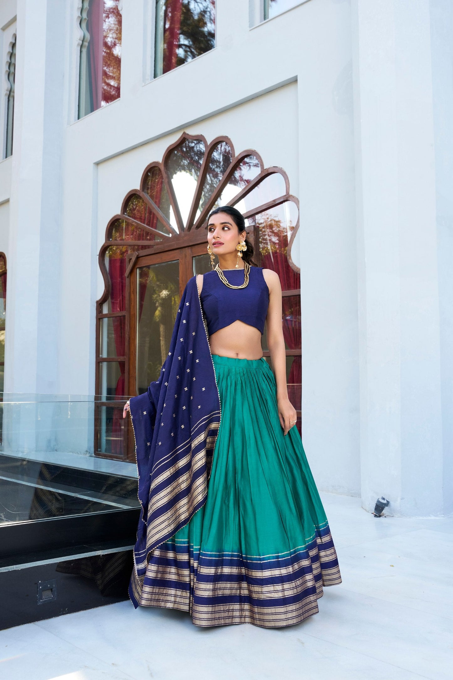 Occasion Wear Green And Blue Color Pure Chanderi Plain With Zari Weaving Work Border Lehenga Choli