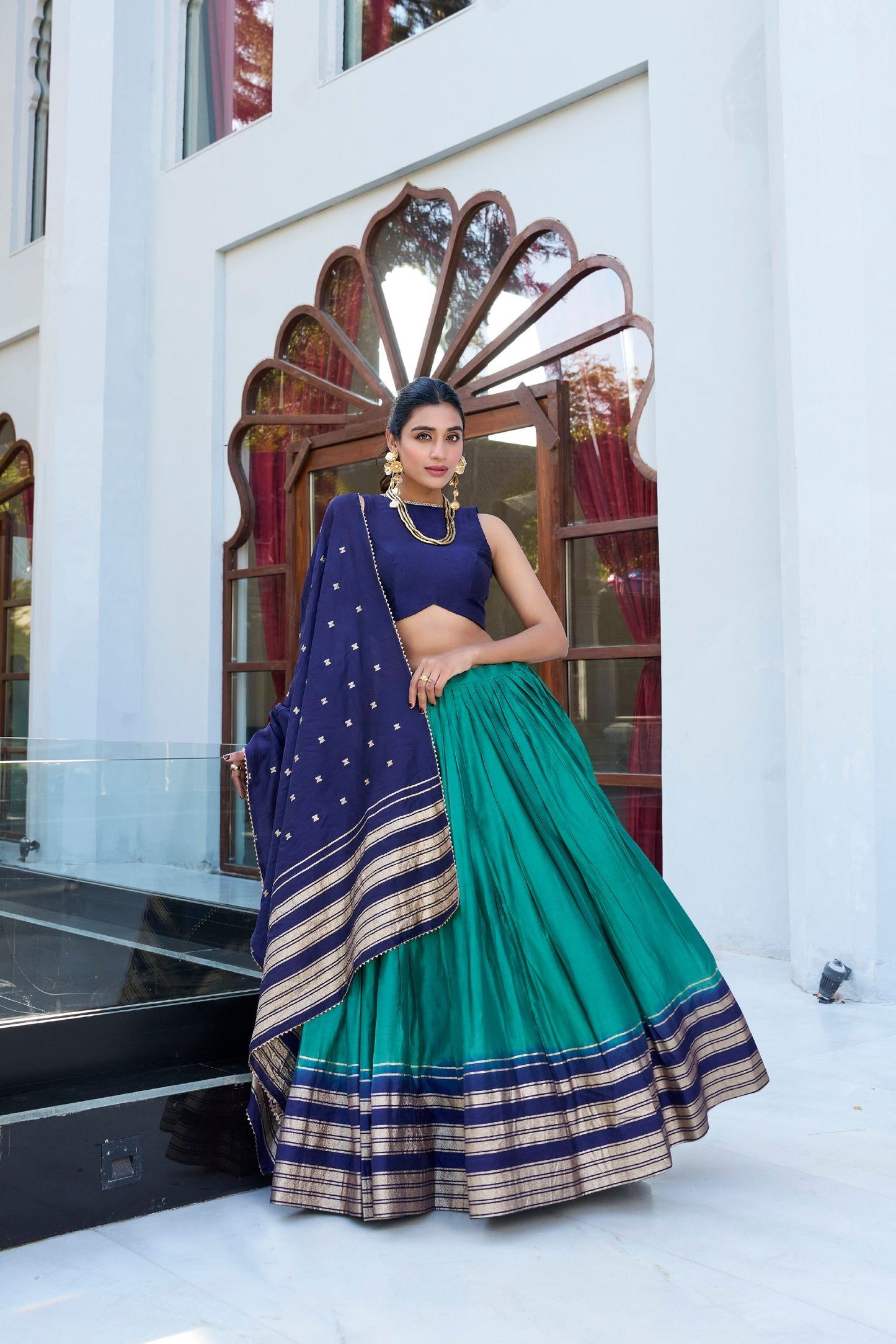 Occasion Wear Green And Blue Color Pure Chanderi Plain With Zari Weaving Work Border Lehenga Choli