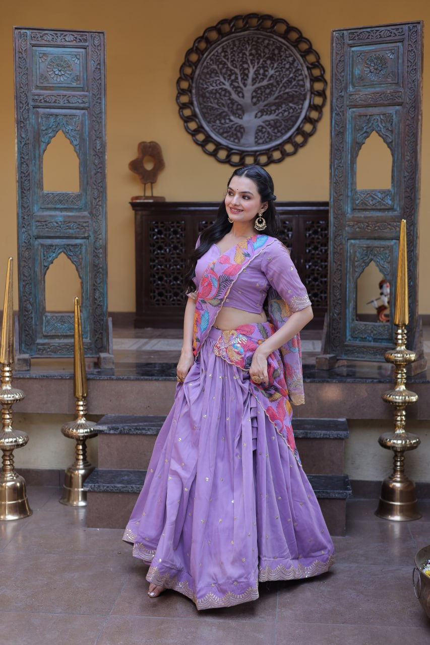 Ravishing Purple Color Zari Sequence Embroidered Lehenga Choli