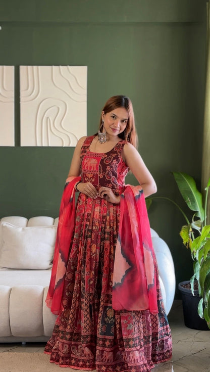 Attractive Maroon Color Soft Organza Patola Printed Gown