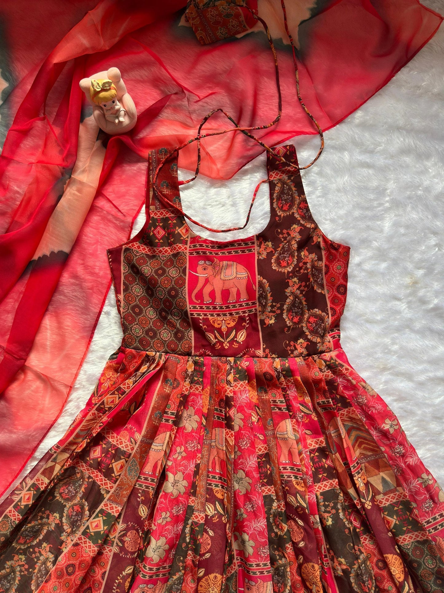 Attractive Maroon Color Soft Organza Patola Printed Gown