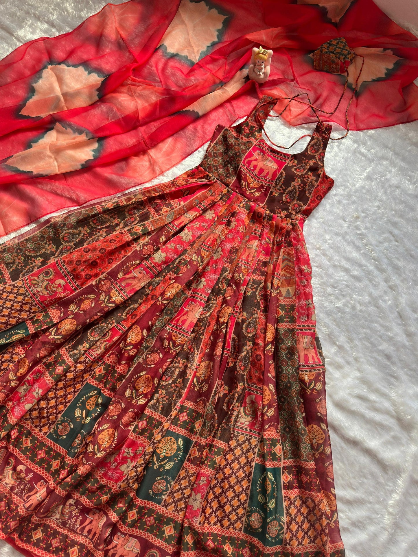 Attractive Maroon Color Soft Organza Patola Printed Gown