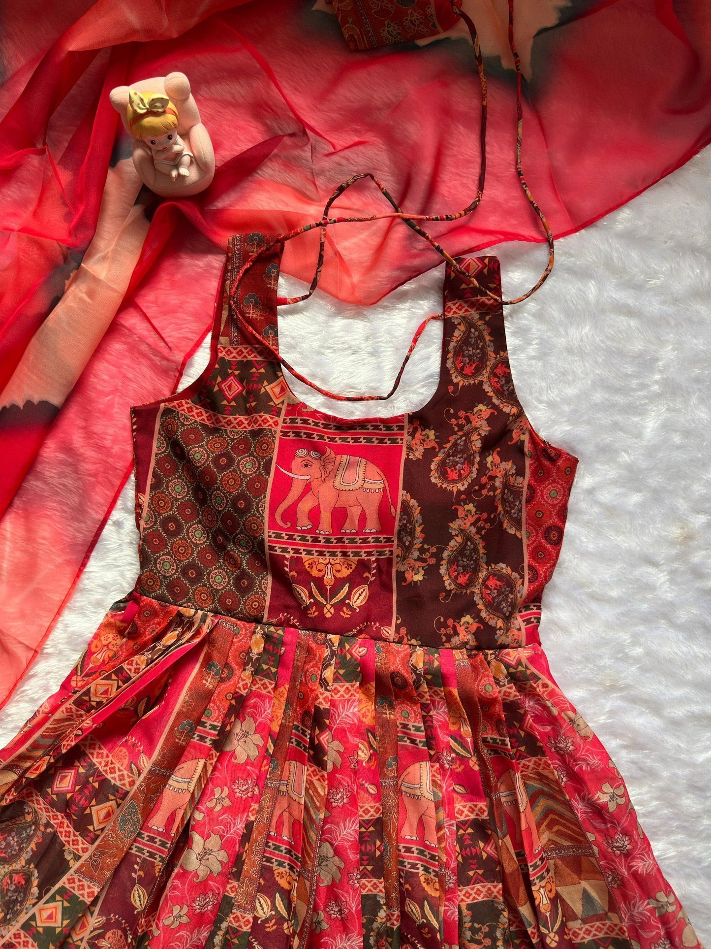 Attractive Maroon Color Soft Organza Patola Printed Gown
