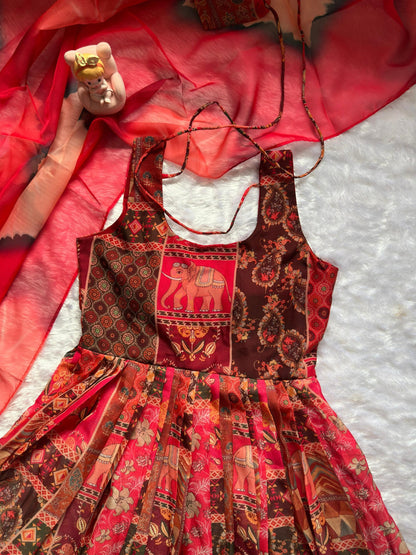 Attractive Maroon Color Soft Organza Patola Printed Gown