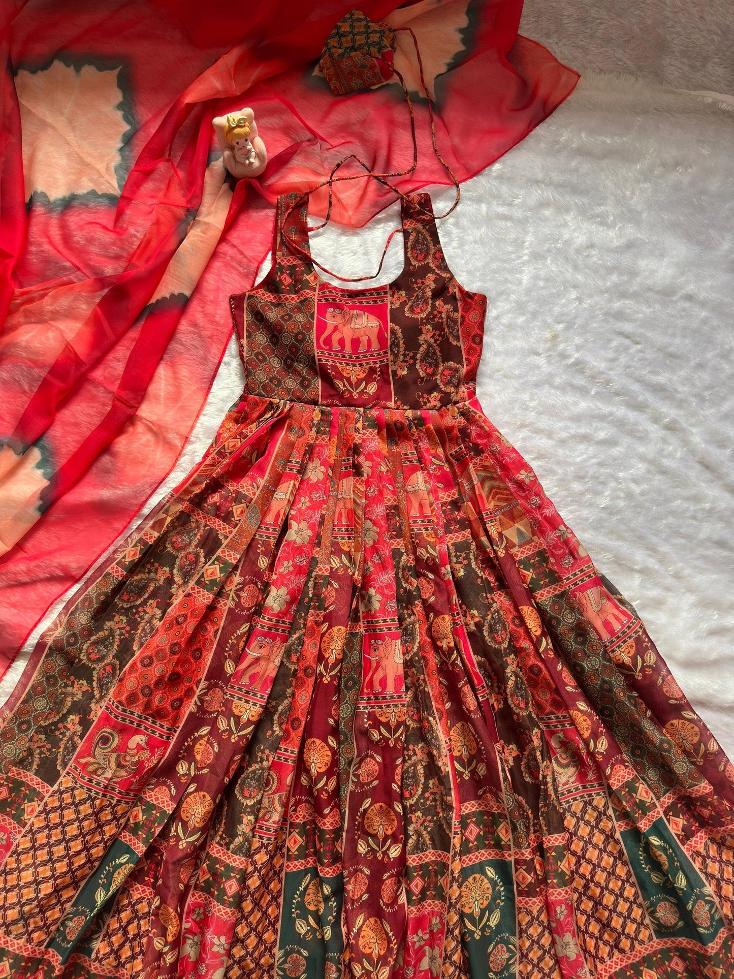 Attractive Maroon Color Soft Organza Patola Printed Gown