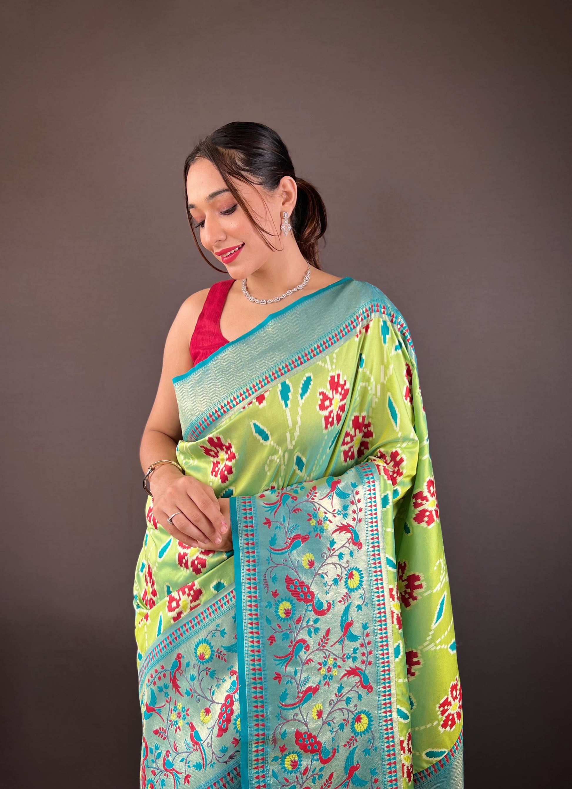 Adorable Silk Patola Weaving Perrot Color Saree