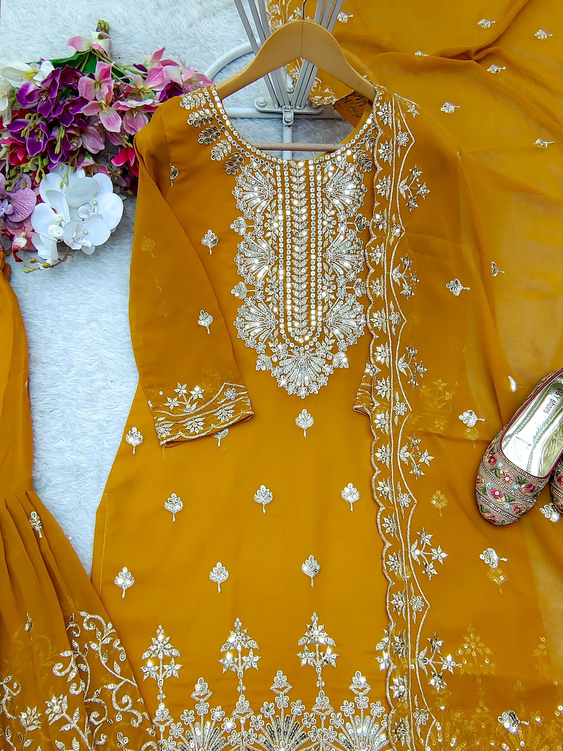 Charming Georgette Mustard Color Sharara Suit