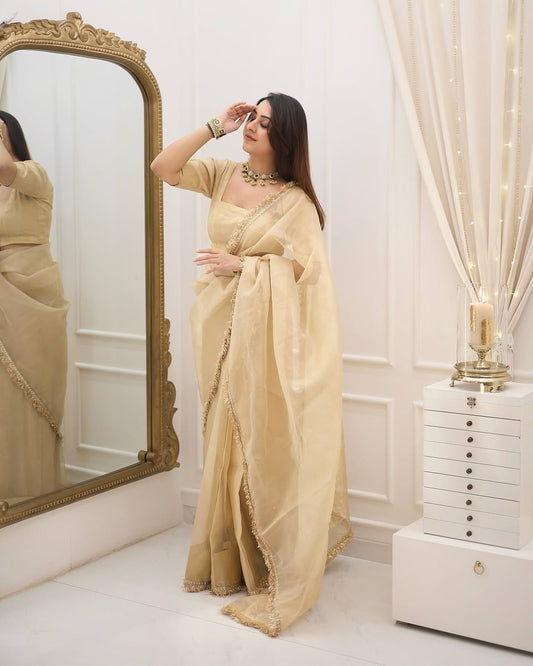 Pretty Goldy Crazy Cream Color Saree