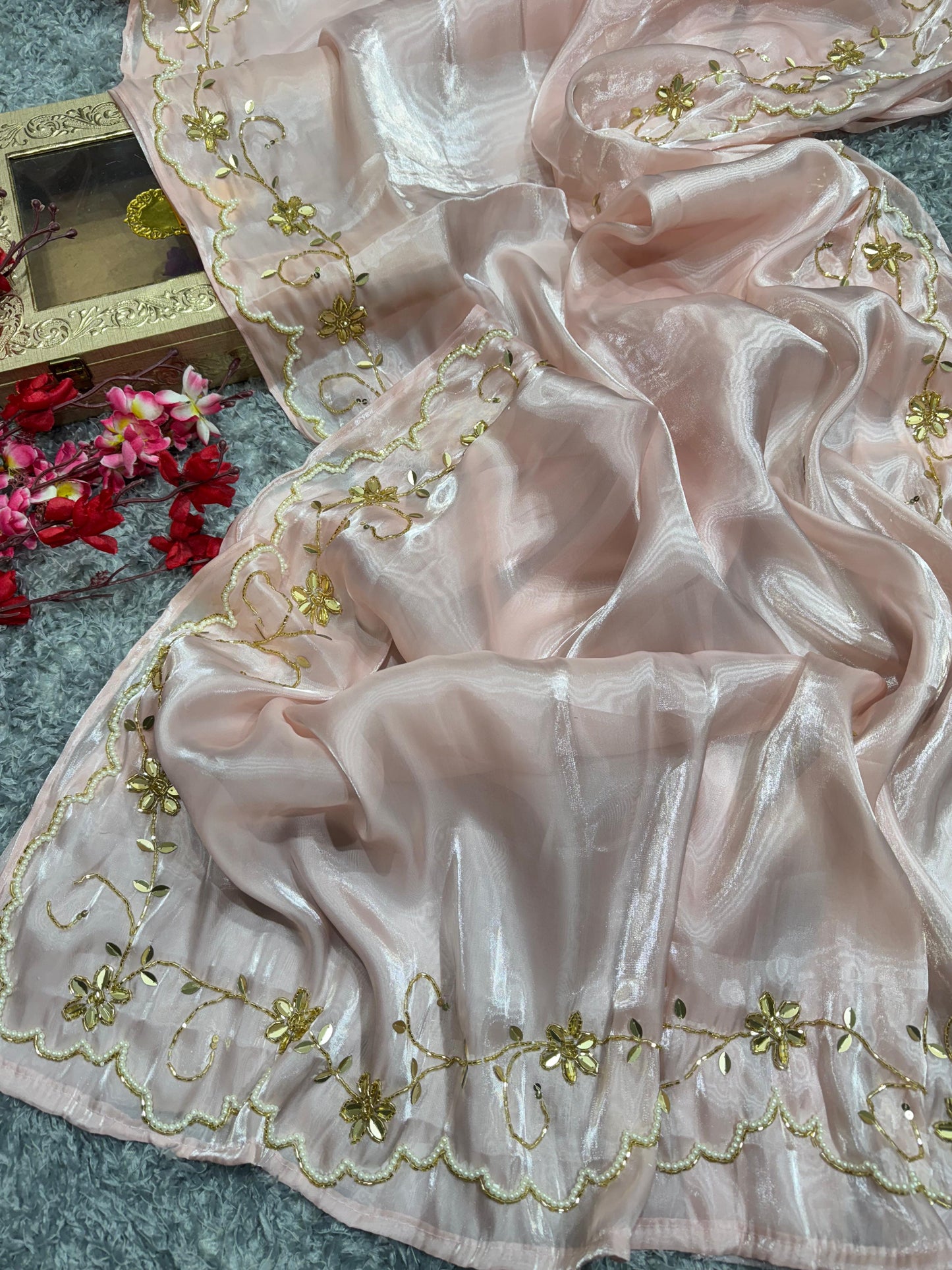 Presenting Jimmi Choo Peach Color Handwork Saree