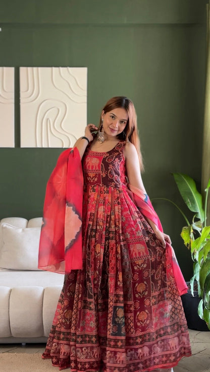 Attractive Maroon Color Soft Organza Patola Printed Gown