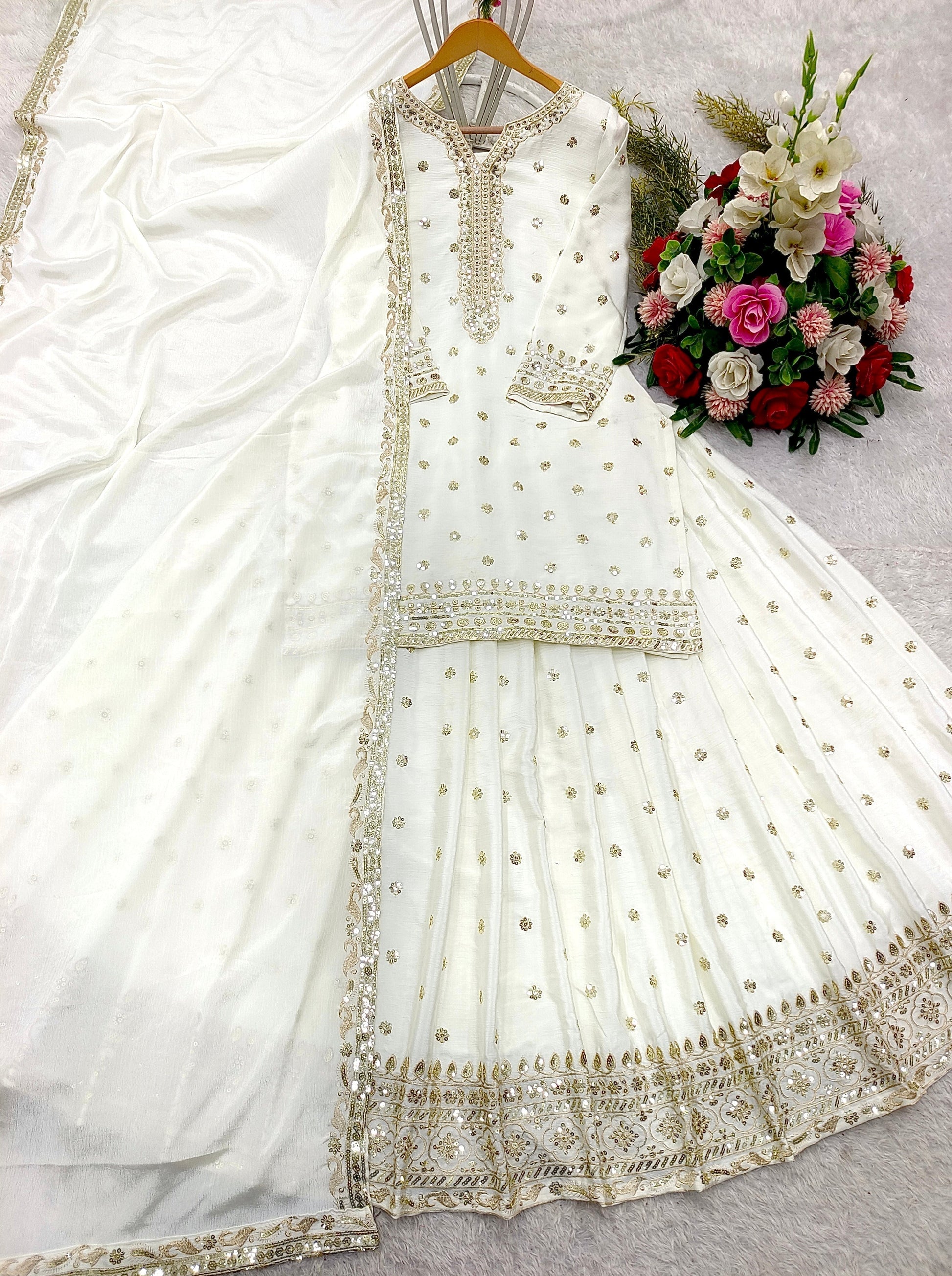 Gorgeous White Color Sequence Work Top With Lehenga