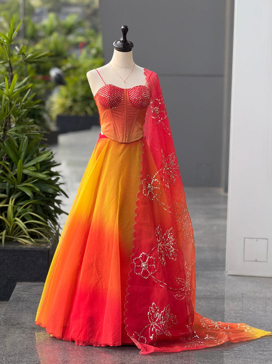Haldi Function Wear Yellow And Orange Color Lehenga With Trendy Corset Pattern Blouse And Designer Batwa