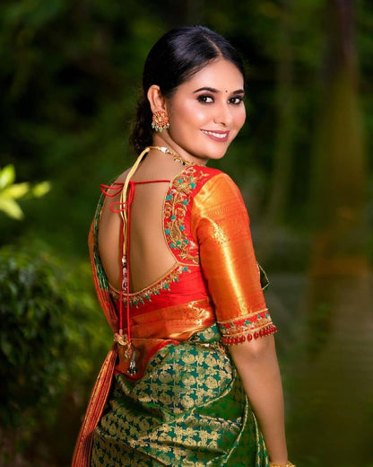Fabulous Red And Green Peacock Design Saree