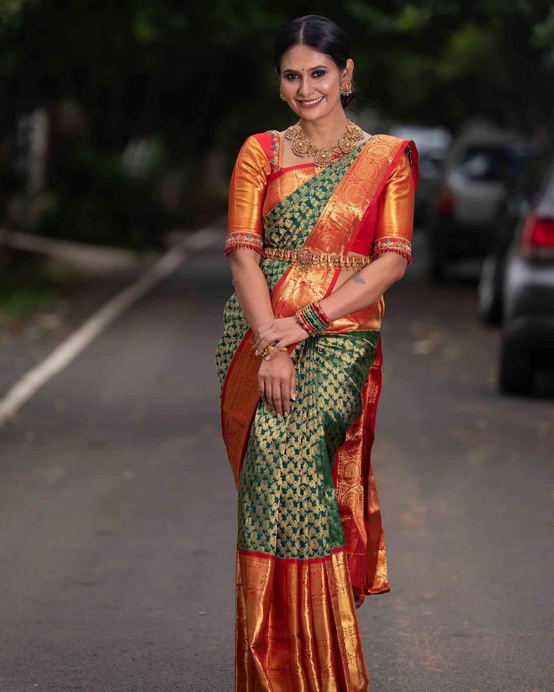 Fabulous Red And Green Peacock Design Saree
