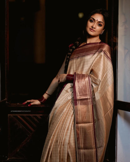 Stunning Cream Color Saree With Maroon Border