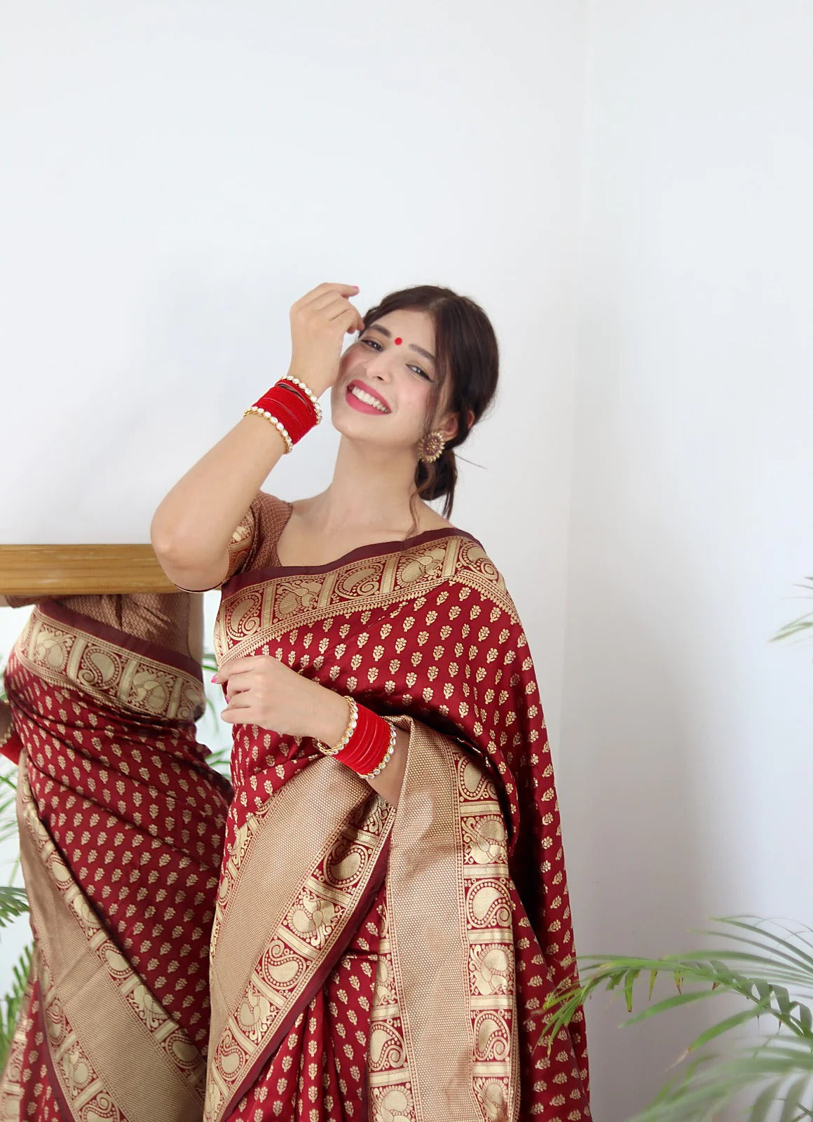 Demanding Maroon Color Golden Jari Design Saree
