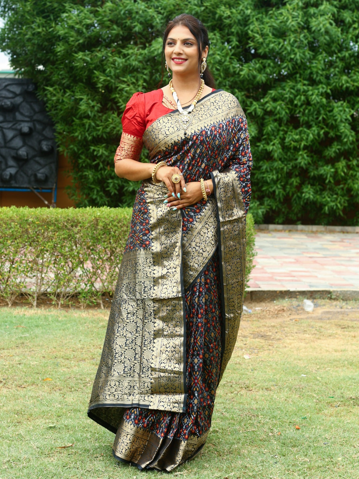 Gorgeous Black Color All Over Patola Silk Saree