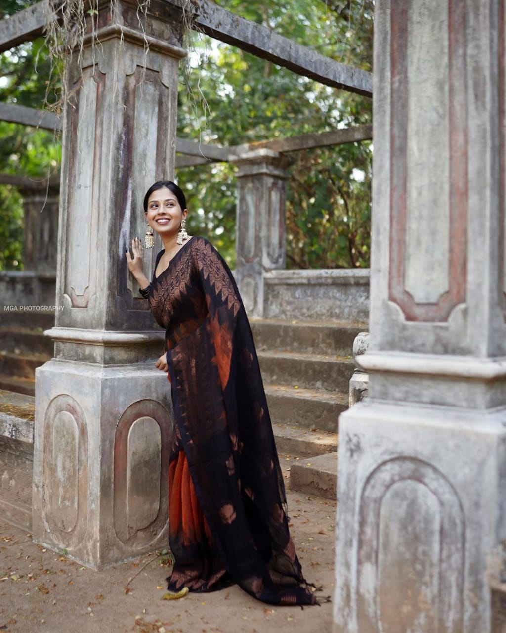 Mesmerizing  Black With Orange Color Saree