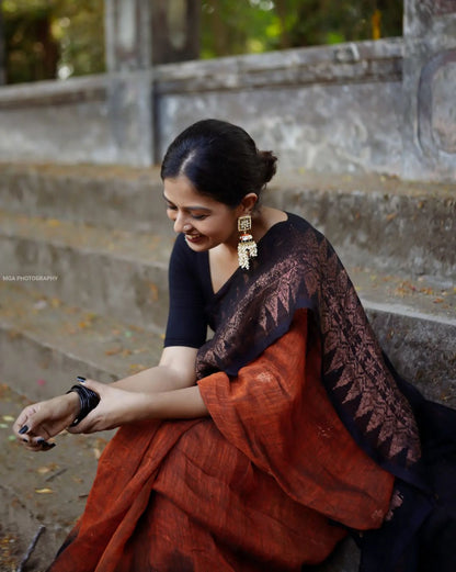 Mesmerizing  Black With Orange Color Saree