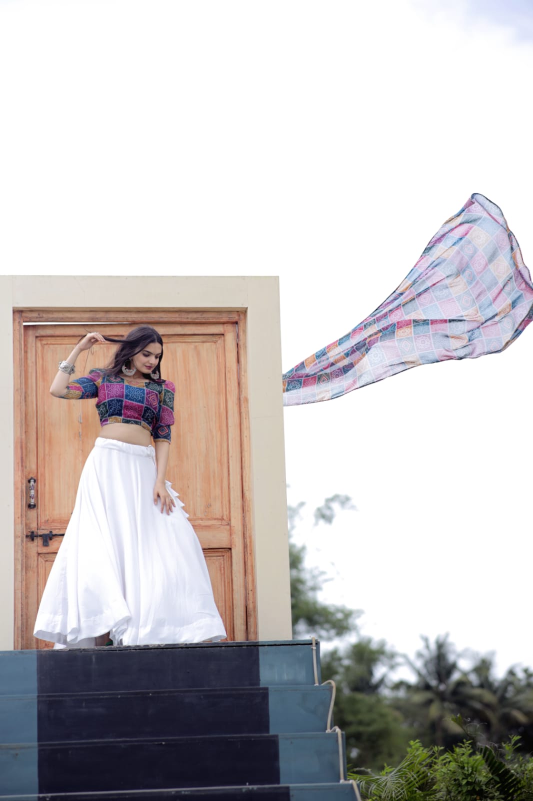 Exclusive Multi Design Top With Plain White Lehenga