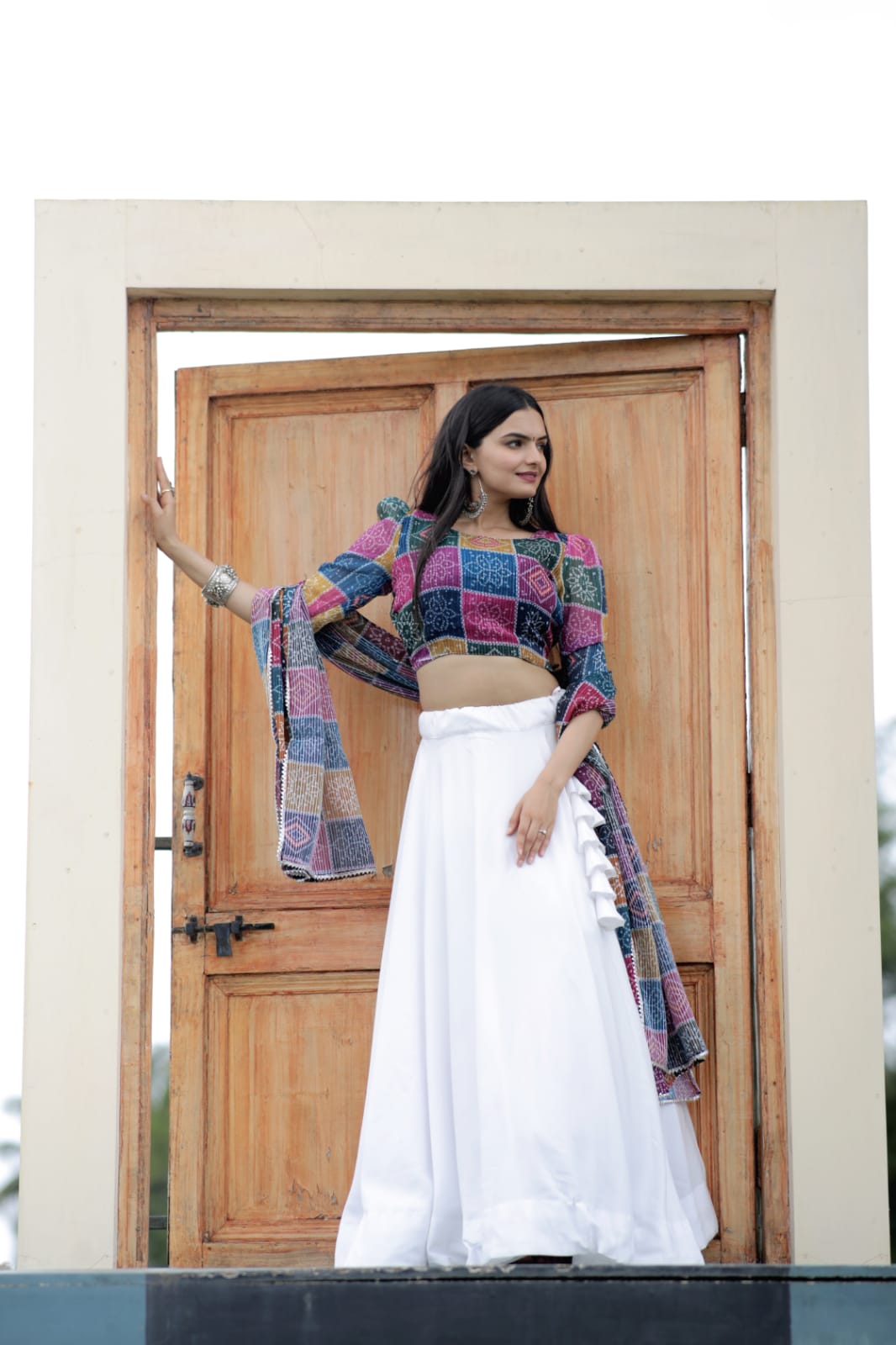 Exclusive Multi Design Top With Plain White Lehenga