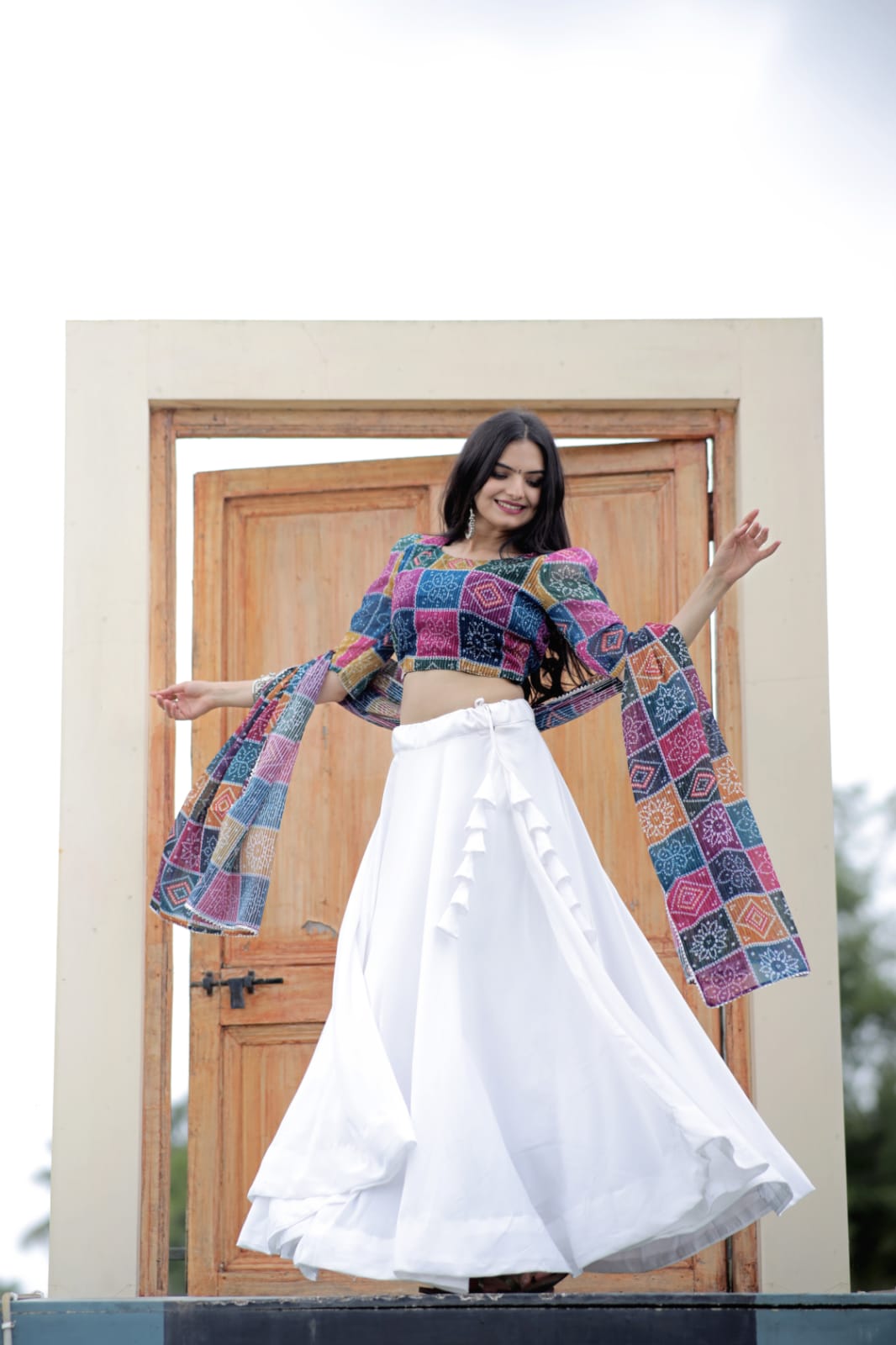 Exclusive Multi Design Top With Plain White Lehenga