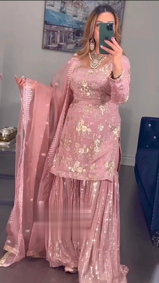 Delightful Embroidery Sequence Work Peach Color Sharara Suit