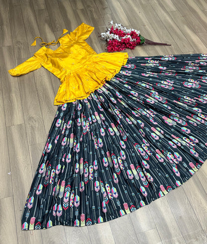 Trendy Yellow Color Top With Printed Black Lehenga