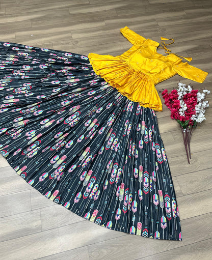 Trendy Yellow Color Top With Printed Black Lehenga