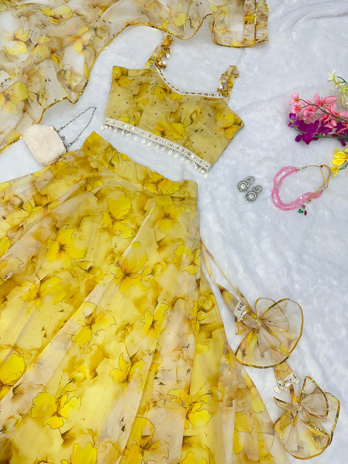 Mesmerizing Yellow Color Organza Lehenga Choli