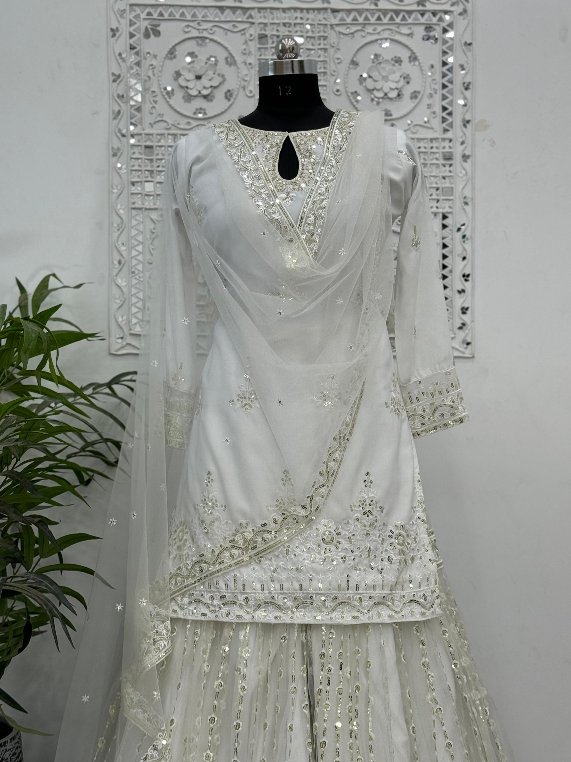 Outstanding  Sequins Work White Color Sharara Suit