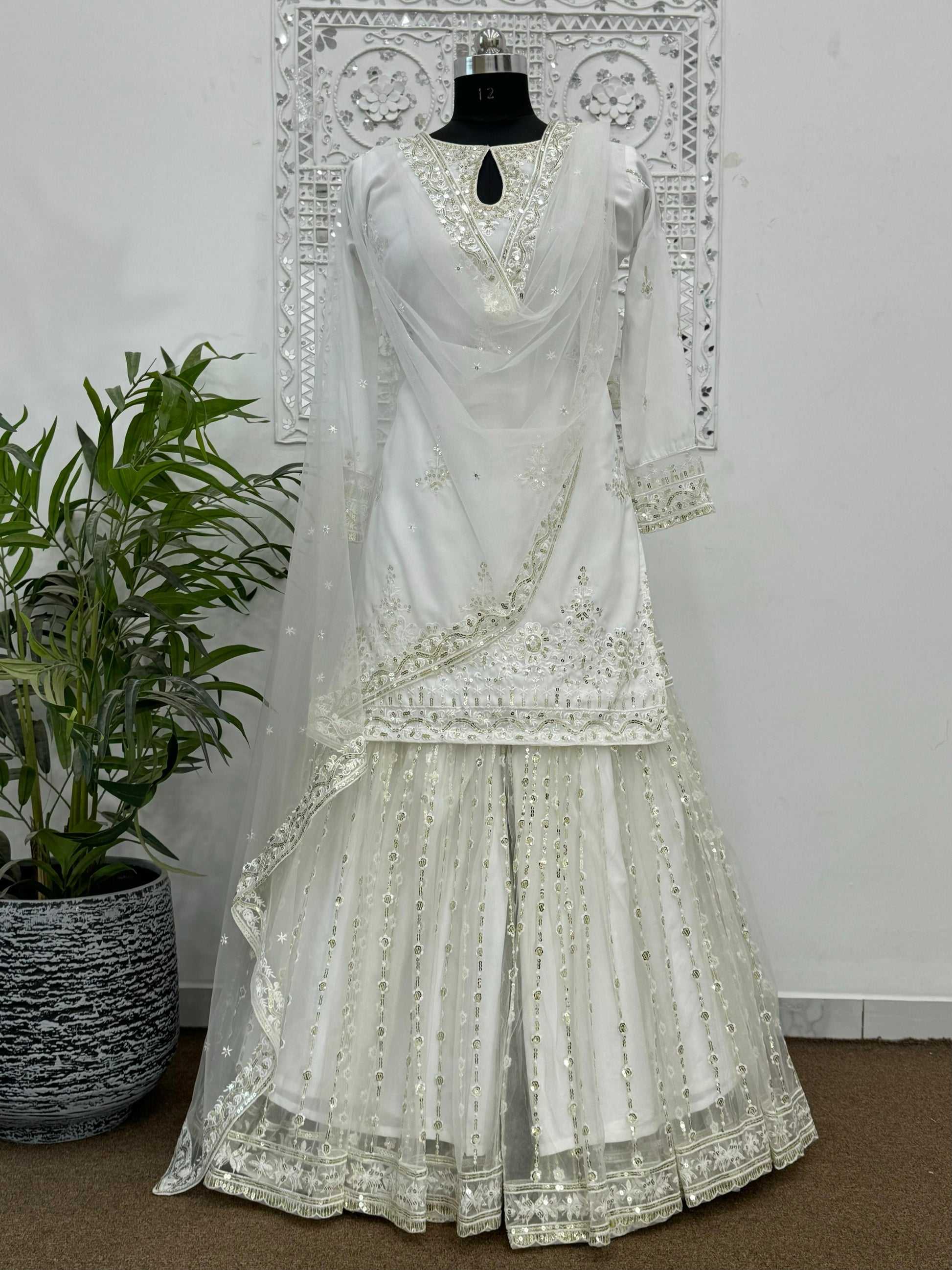 Outstanding  Sequins Work White Color Sharara Suit