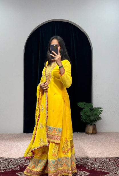 Mirror With Embroidery Work Yellow Color Sharara Suit