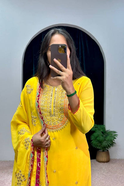 Mirror With Embroidery Work Yellow Color Sharara Suit