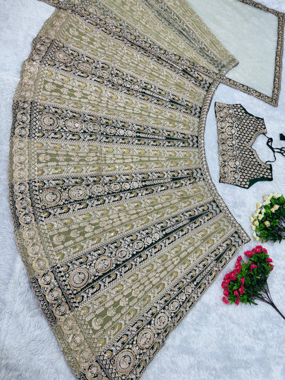 Pretty Pista With Black Mirror Hand Work Lehenga Choli