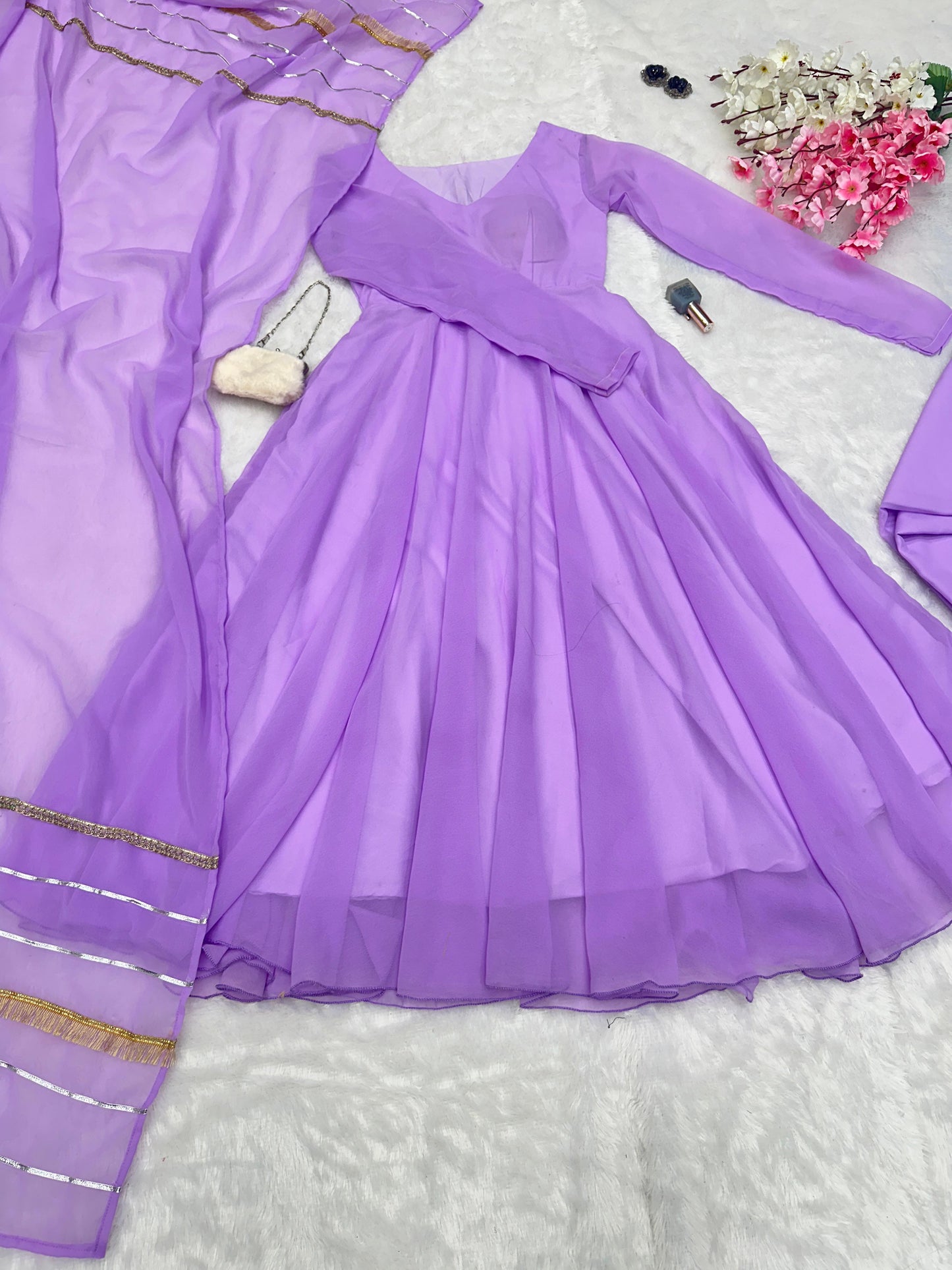 Eyes Catching Lavender Color Georgette With Huge Flair Designer Gown