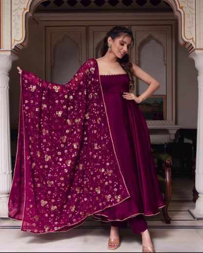 Ceremony Wear Wine Color Heavy Faux Georgette And Fully Flair Designer Gown