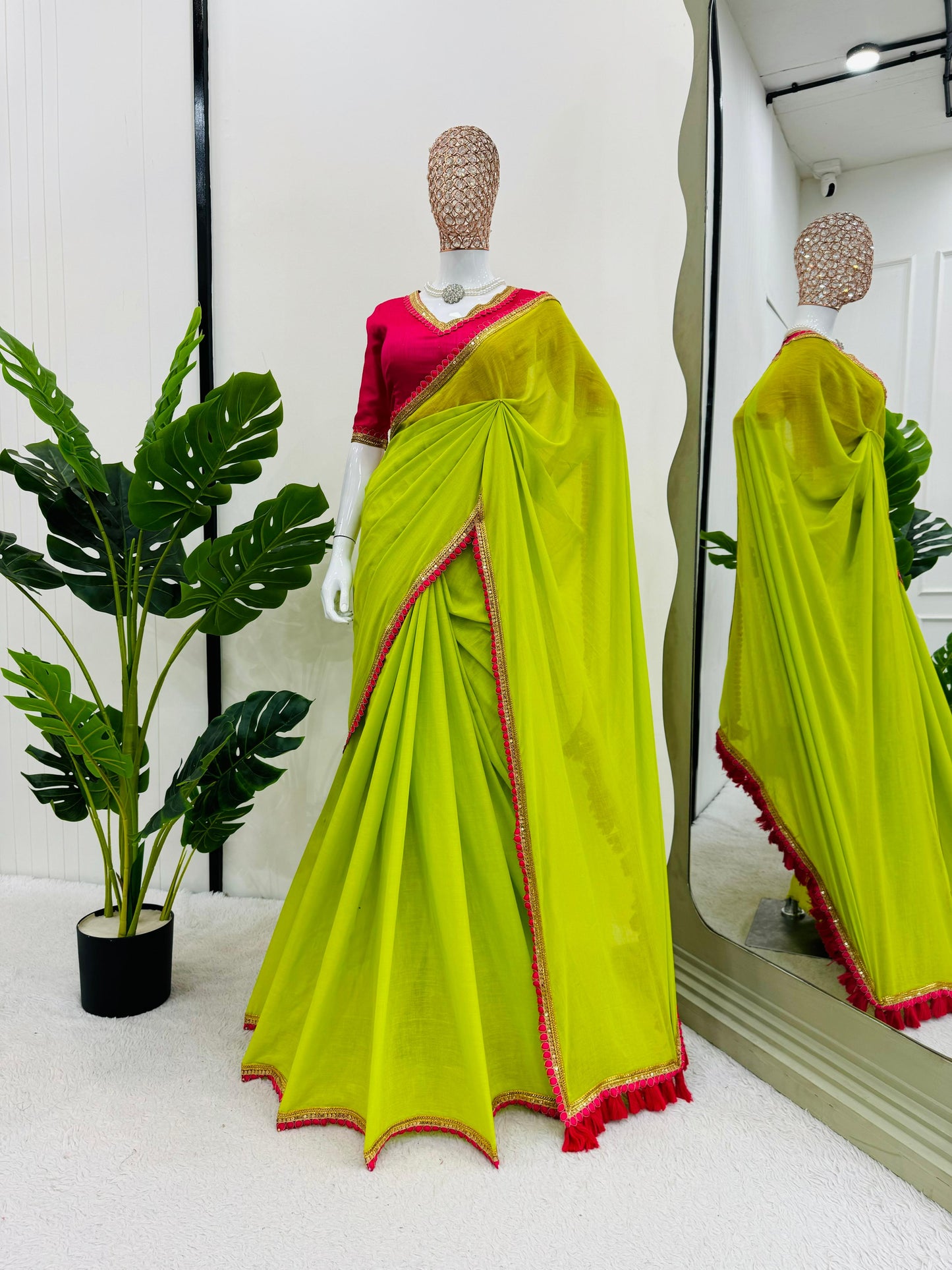 Gorgeous Parrot Green Color Mul Cotton With Fancy Lace And Heavy Latkan Designer Saree