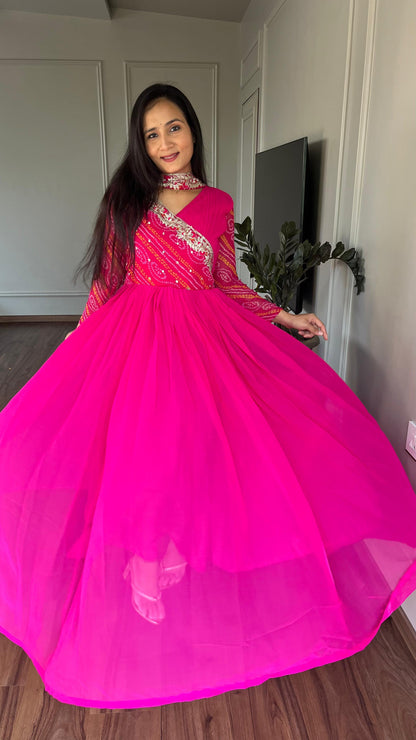 Luxuriant Pink Color Pure Bandhej With Faux Georgette And Sequence Embroidery Work Beautiful Gown