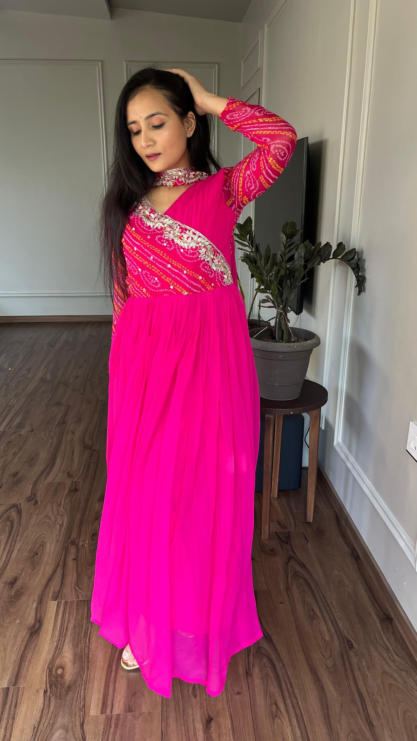 Luxuriant Pink Color Pure Bandhej With Faux Georgette And Sequence Embroidery Work Beautiful Gown