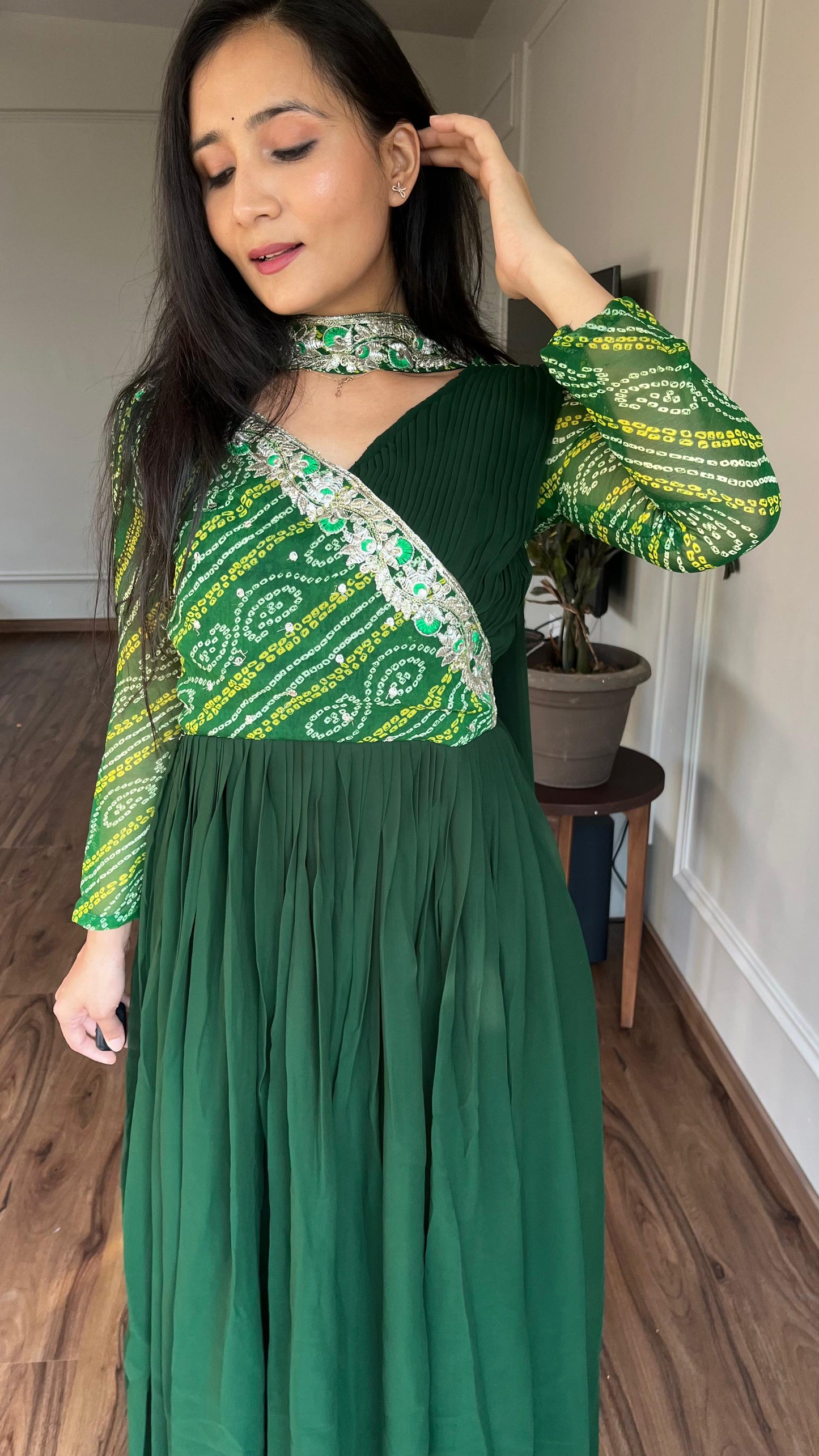 Luxuriant Green Color Pure Bandhej With Faux Georgette And Sequence Embroidery Work Beautiful Gown