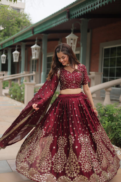 Party Wear Maroon Color Rangoli Silk With Heavy Sequins And Thread Embroidered Work Beautiful Lehenga Choli