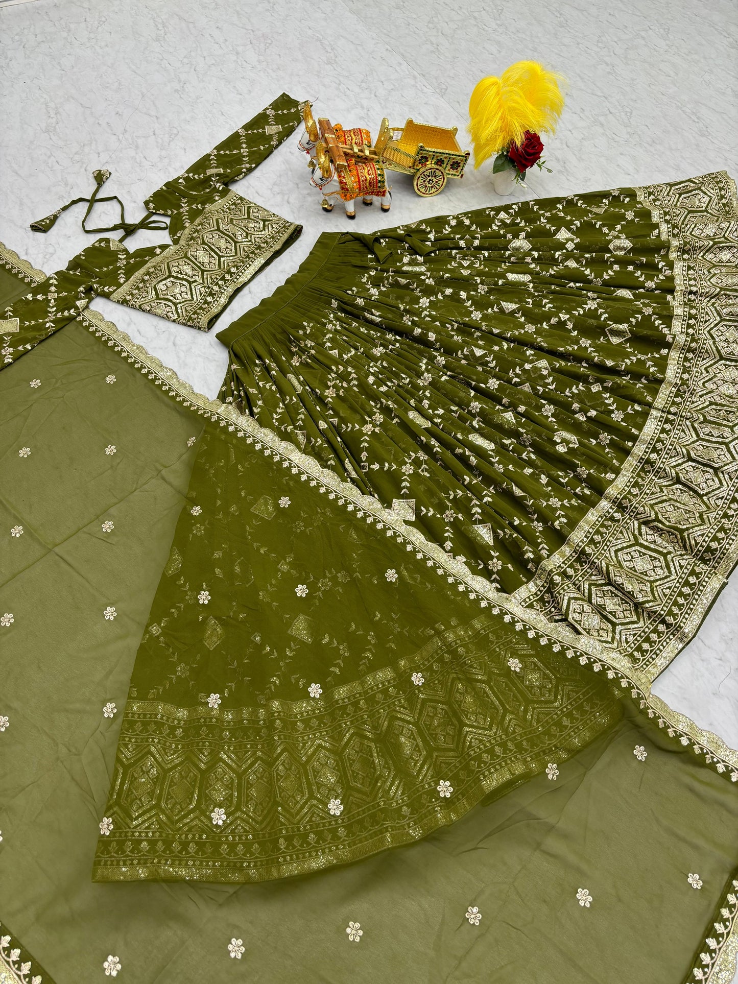 Wedding Wear Green Color Heavy Faux Georgette With Embroidery Sequence Work Designer Lehenga Choli