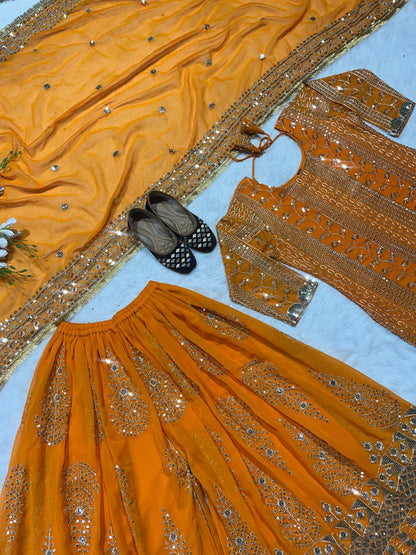 Eyes Catching Georgette Embroidery Work Orange Color Sharara Suit
